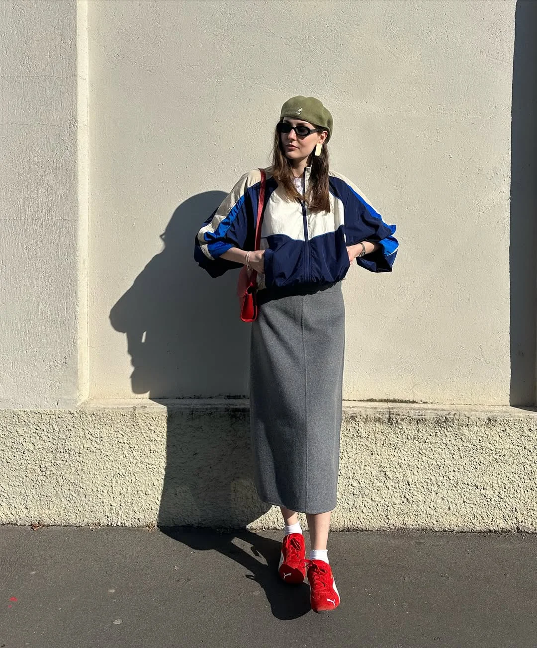 fall skirt and sneakers outfits 2026 + Gray Wool Midi Skirt With A Track Jacket And Red Sneakers