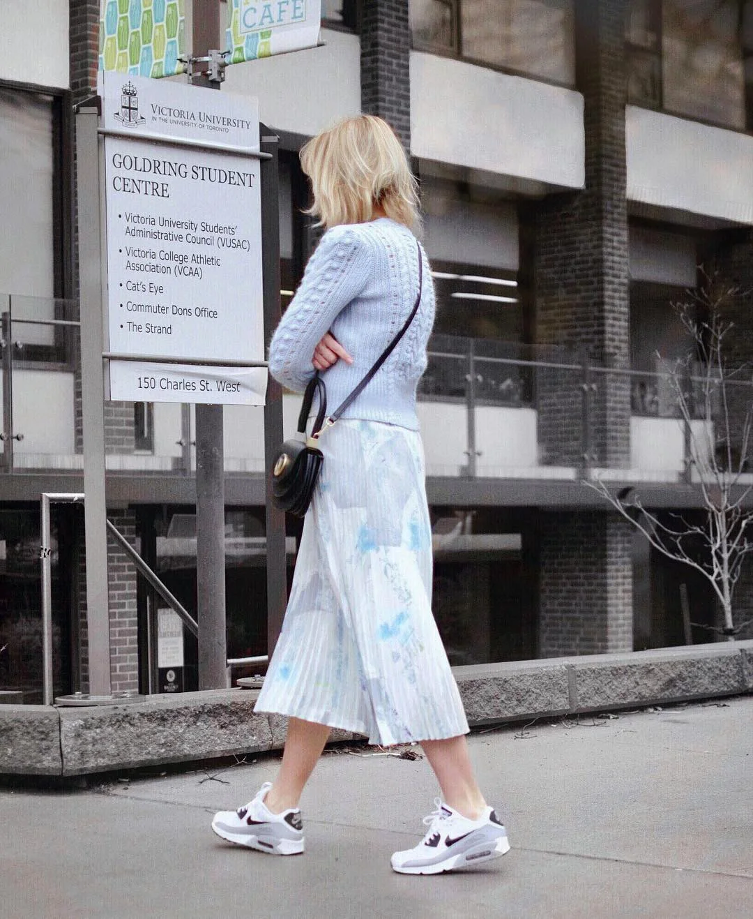 fall skirt and sneakers outfits 2026 + Pale Pleated Midi Skirt With A Soft Sweater And Nikes