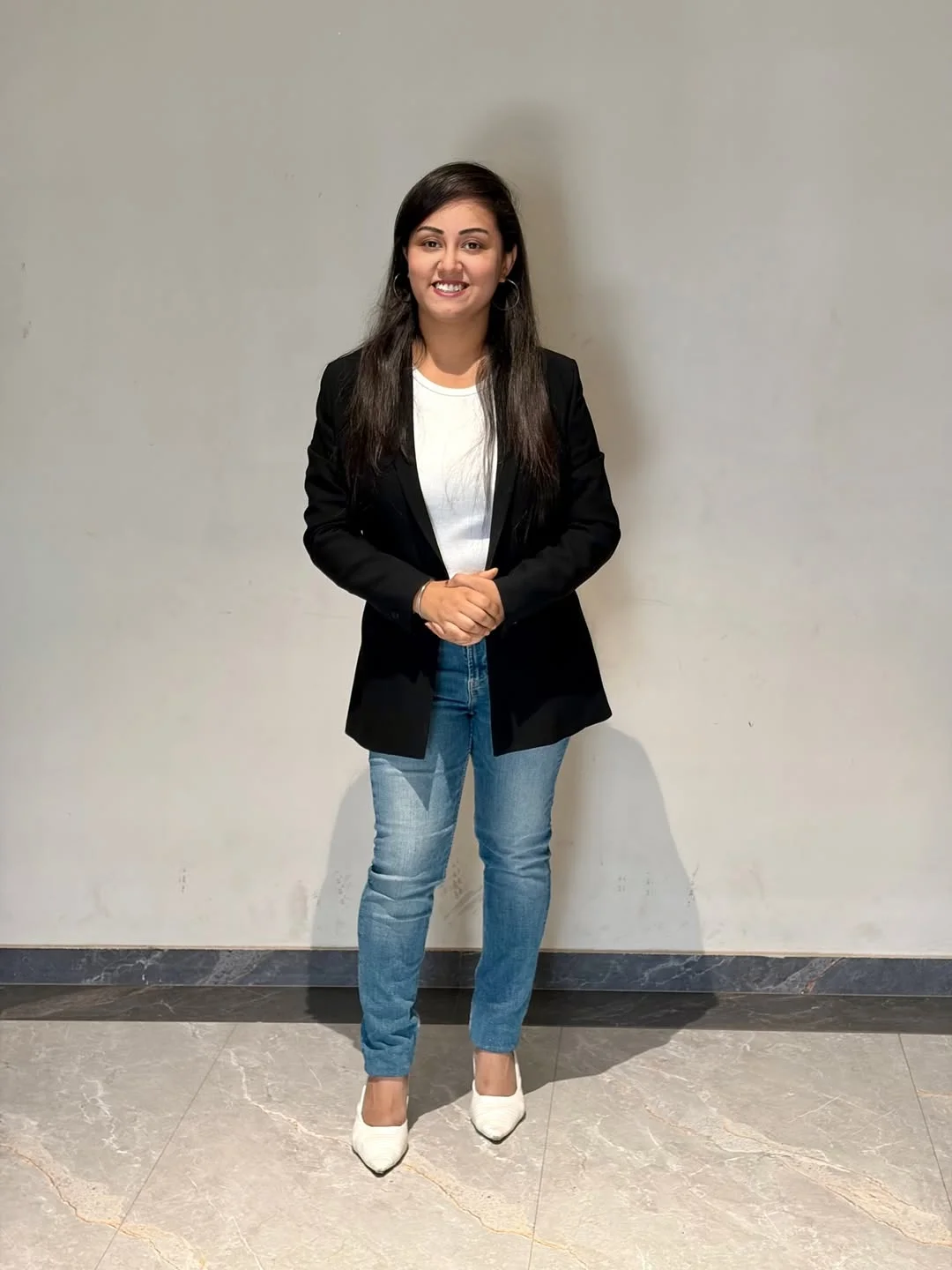 fall smart casual work outfit for women 2026 Black Blazer With Jeans And White Pointed Heels