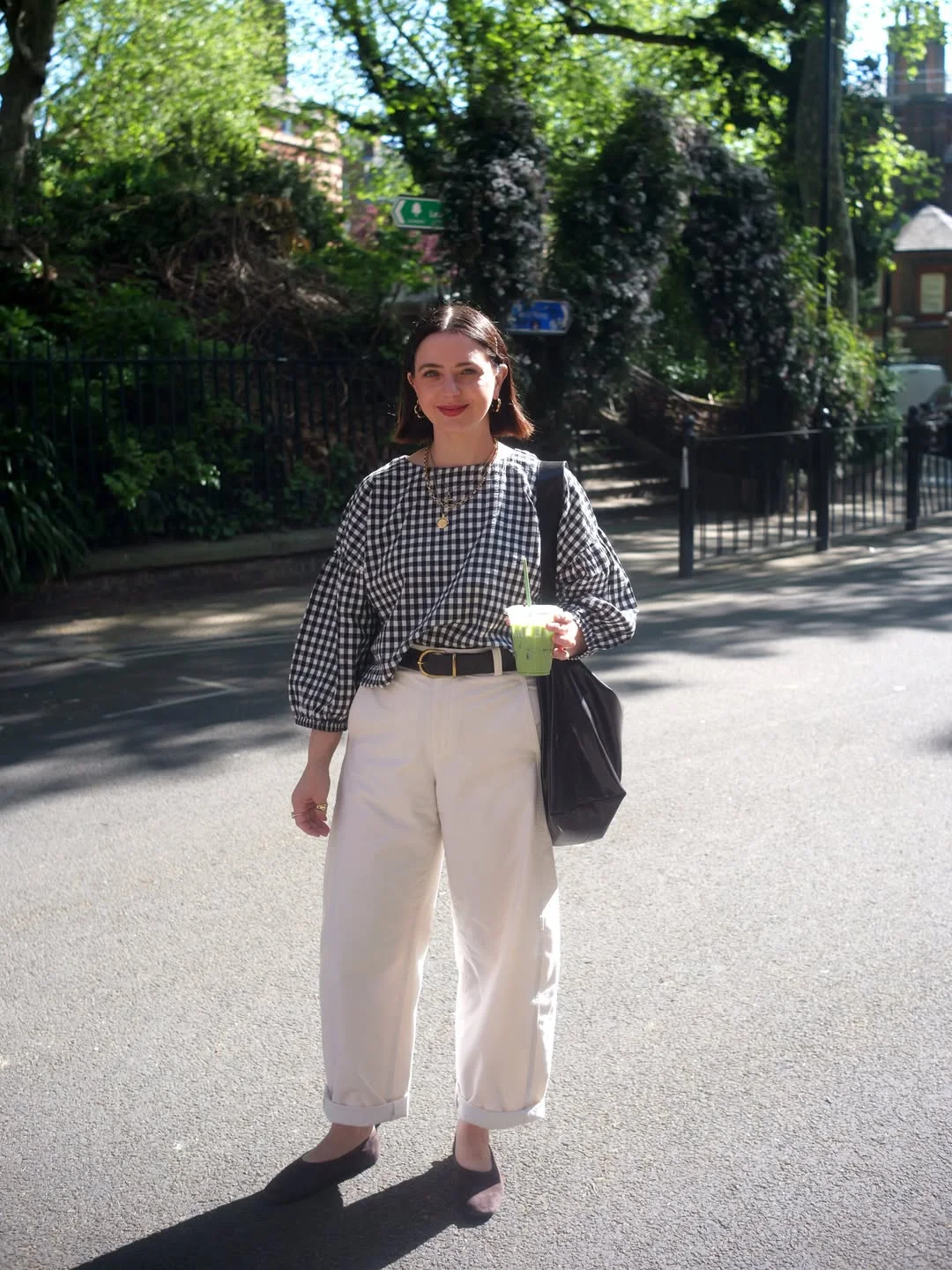 fall smart casual work outfit for women 2026 Gingham Blouse With Cream Trousers And Everyday Flats