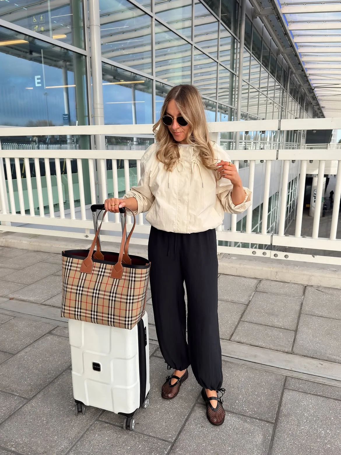 fall travel outfits 2026 + Soft Utility Layers With Relaxed Black Pants