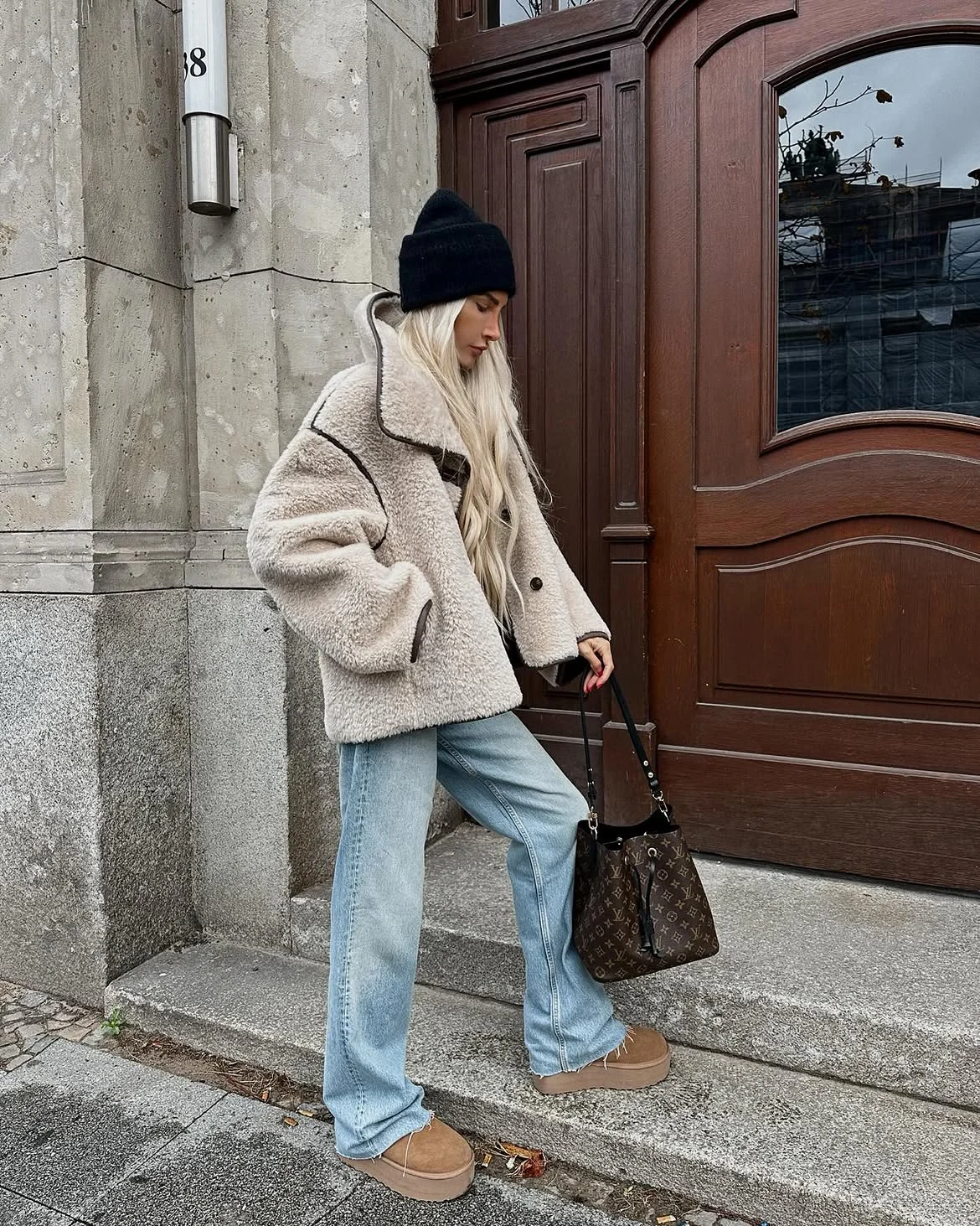fall travel outfits 2026 + Shearling Jacket and Denim for a Cold-Weather Stop