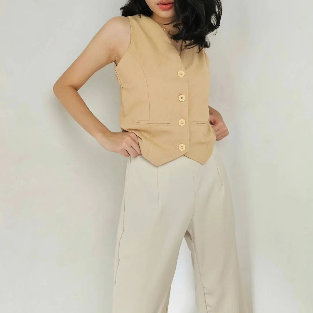 fall vest outfits for women 2026 Tan Waistcoat and Cream Trousers for a Soft Neutral Start