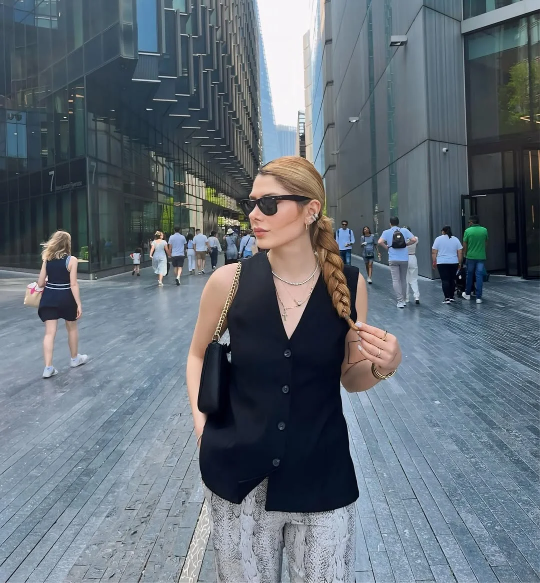 fall vest outfits for women 2026 Oversized Black Vest With Statement Trousers