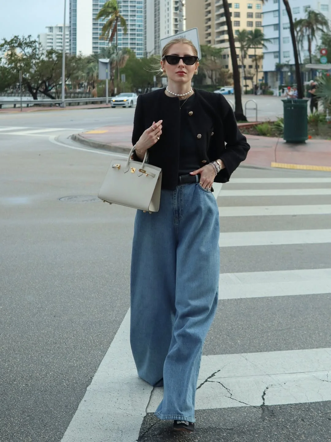 fall vest outfits for women 2026 Cropped Black Jacket and Wide Jeans for Cooler Fall Layers