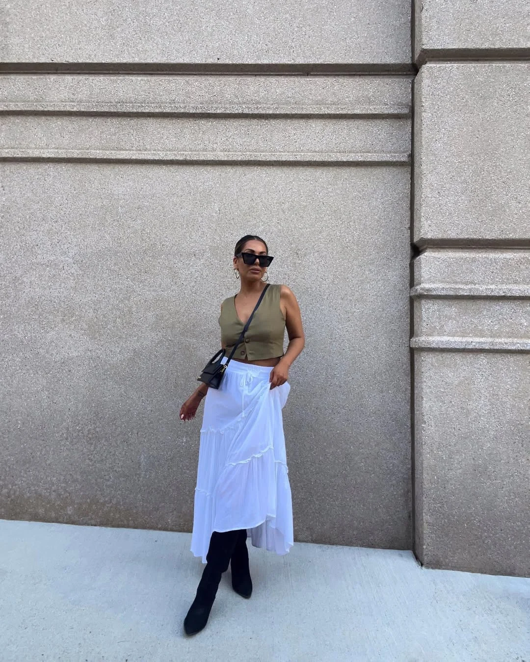fall vest outfits for women 2026 Olive Green Vest With a Flowing White Skirt