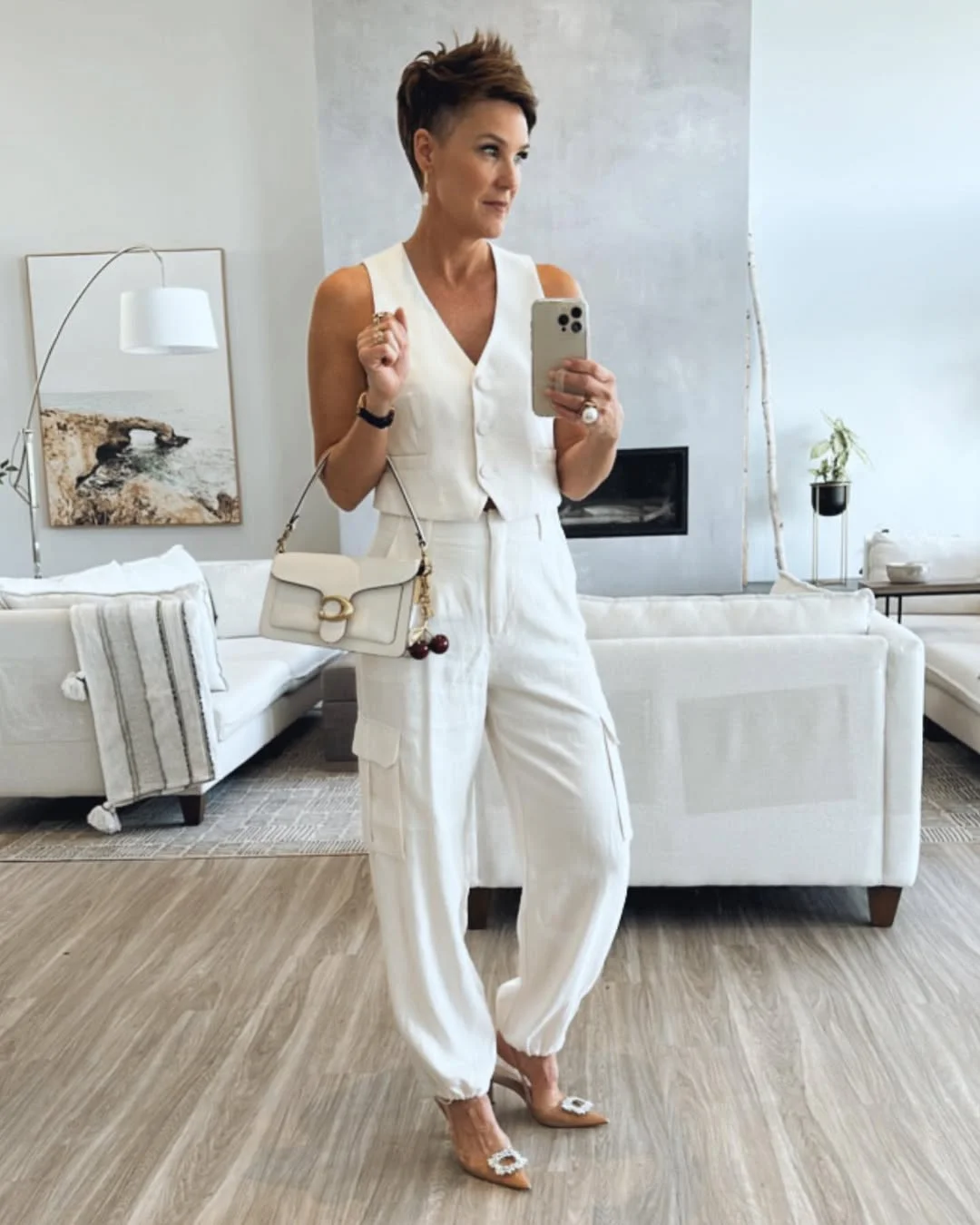 fall vest outfits for women 2026 All-White Vest and Cargo Pants With a Soft Luxe Finish