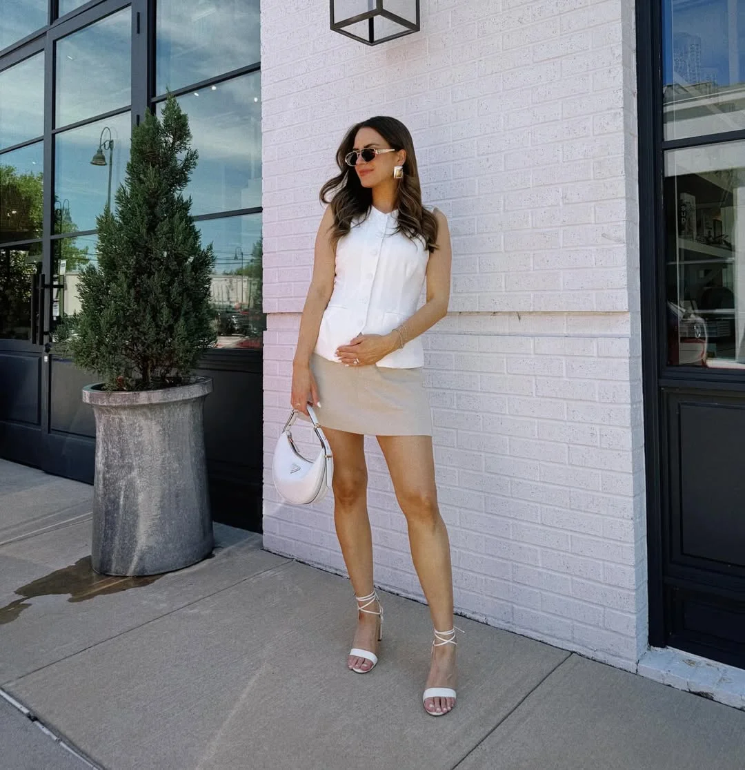 fall vest outfits for women 2026 The White Vest and Mini Skirt Formula for Early Fall