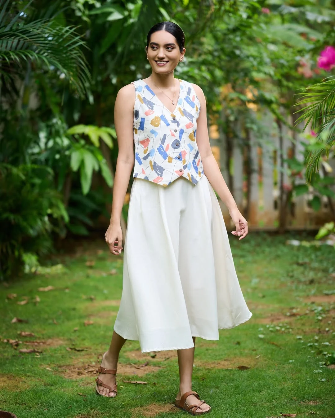 fall vest outfits for women 2026 A Printed Waistcoat With Breezy White Culottes