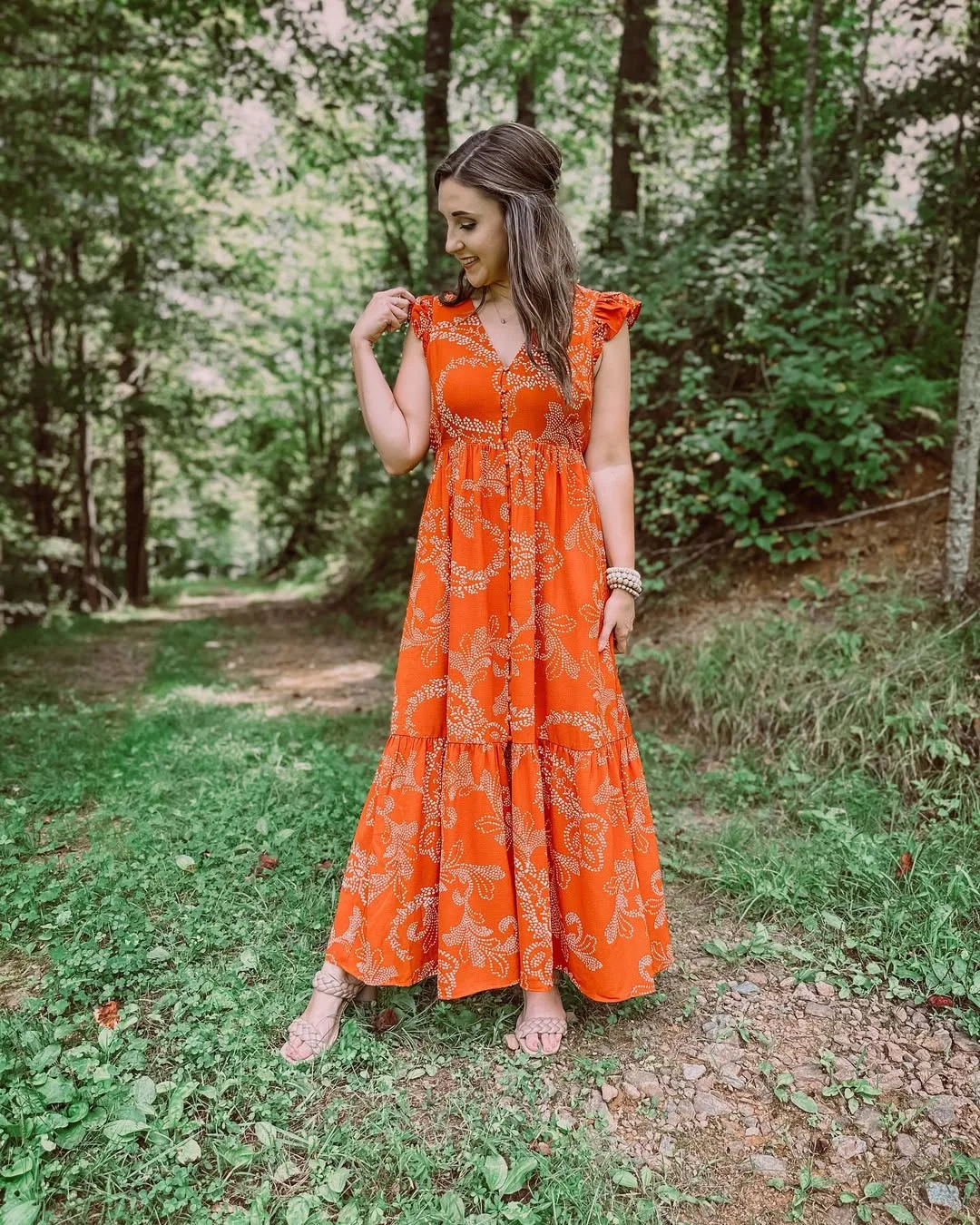 fall wedding guest dress 2026 Orange Tiered Maxi Dress For A Woodland Ceremony