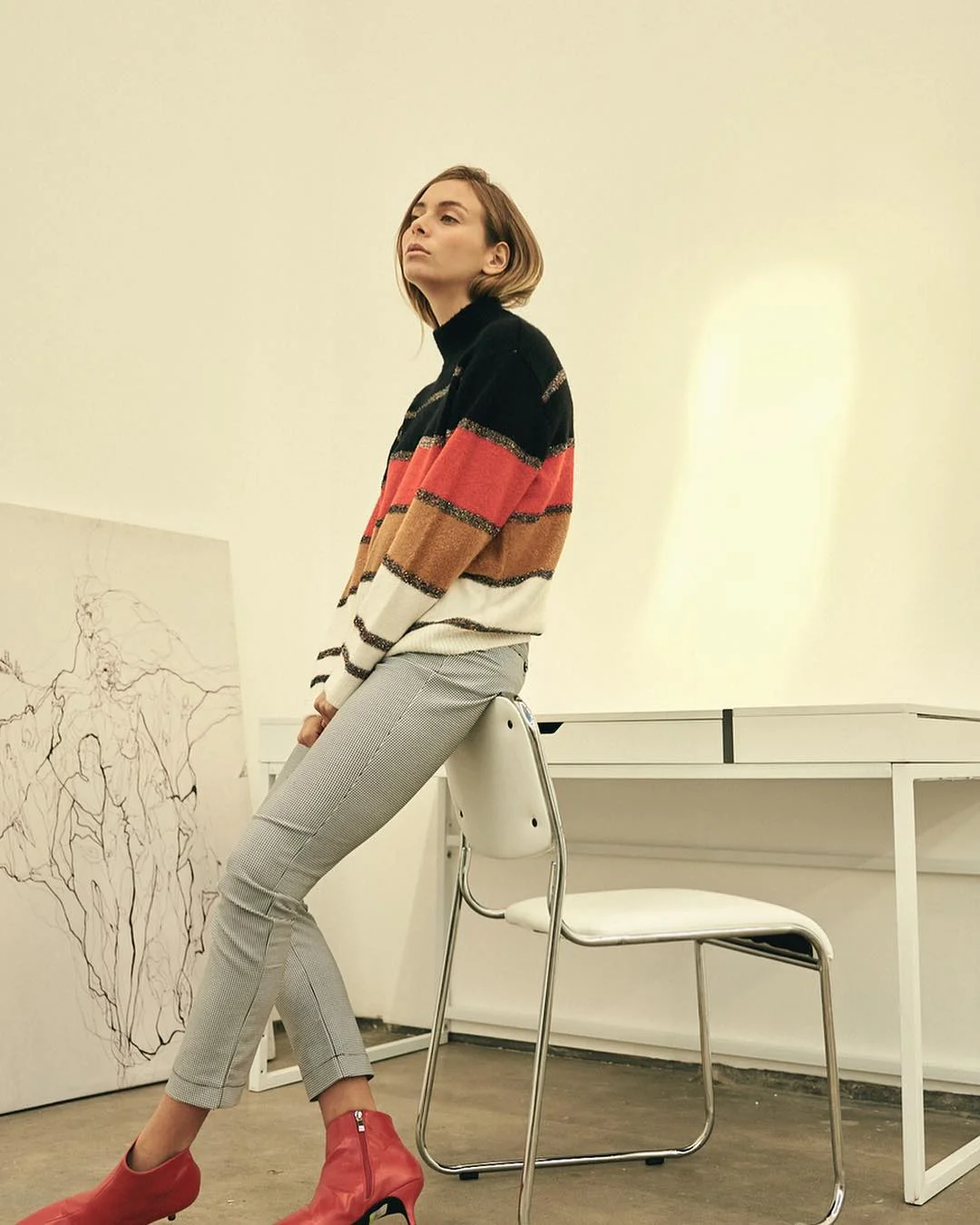 July fashion trends 2026 + Striped Sweater Slim Trousers And Red Boots