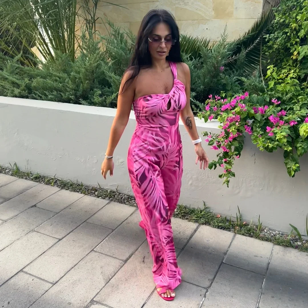 July fashion trends 2026 + Hot Pink Tropical Jumpsuit With Vacation Confidence