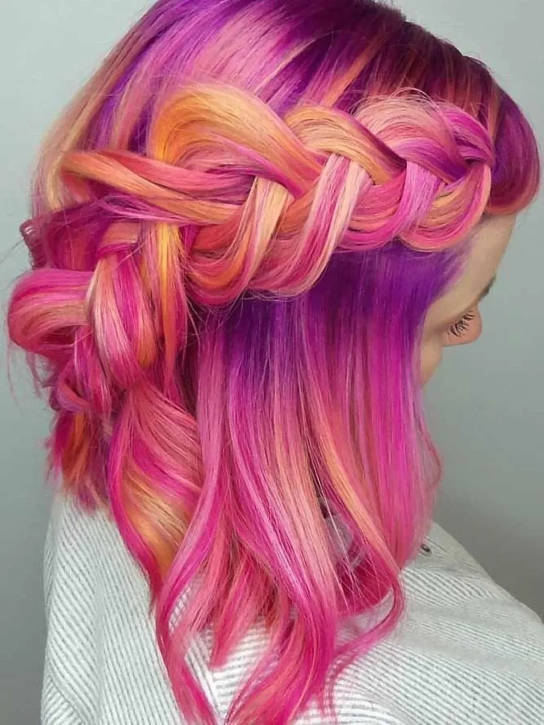 July hair colour ideas 2026 Candy Pink And Orange Braids For A Bold Summer Mood