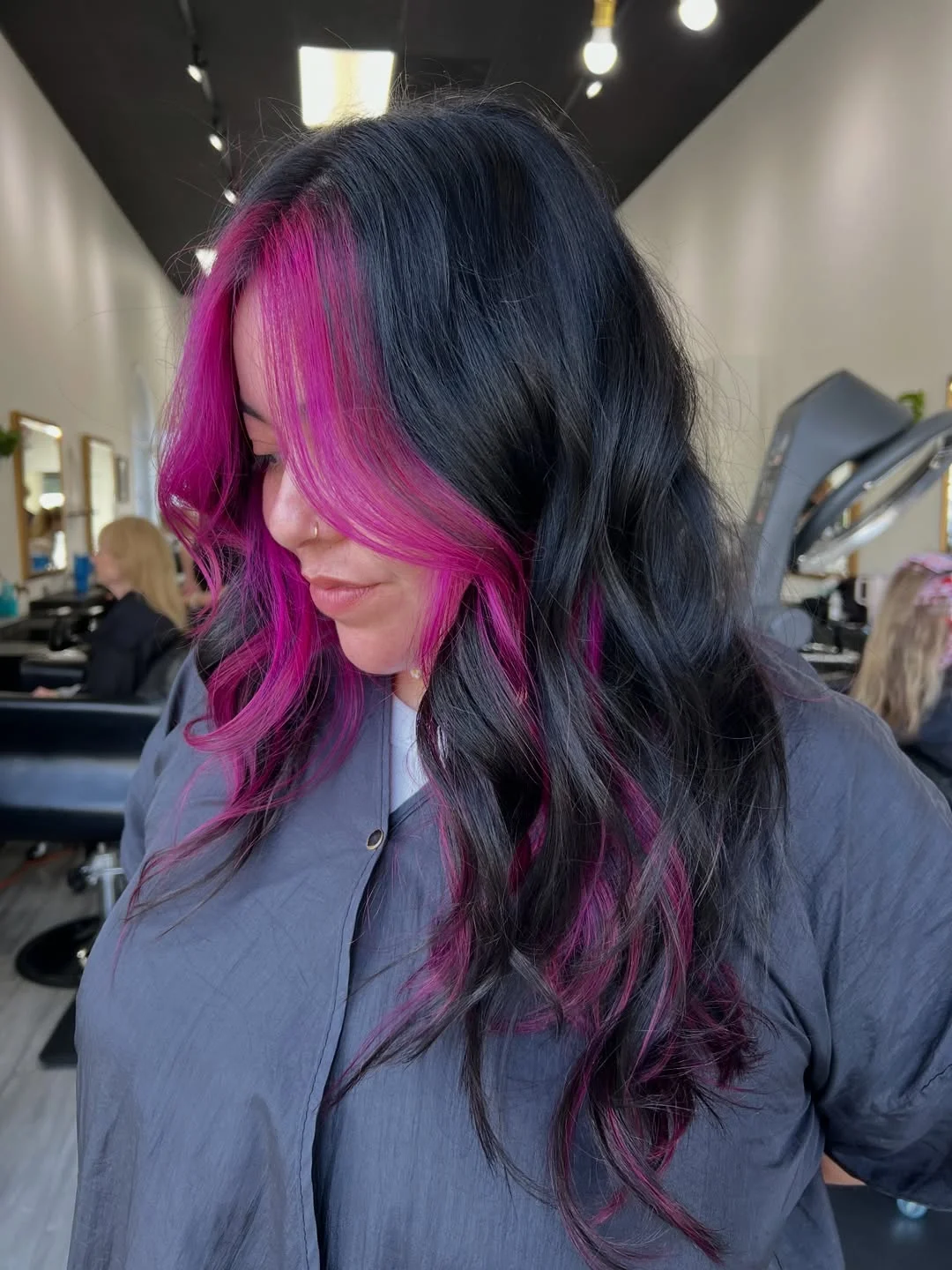 July hair colour ideas 2026 Jet Black Waves With Electric Pink Money Pieces