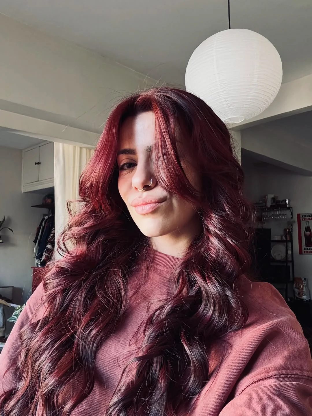 July hair colour ideas 2026 Berry Red Waves With A Soft Romantic Edge