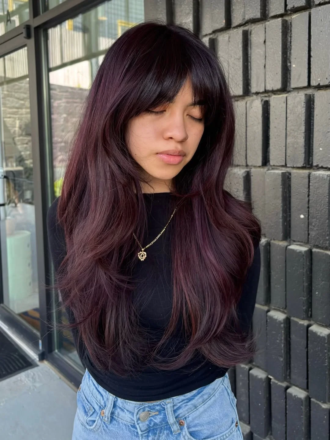 July hair colour ideas 2026 Blackberry Plum Layers With Soft Curtain Bangs