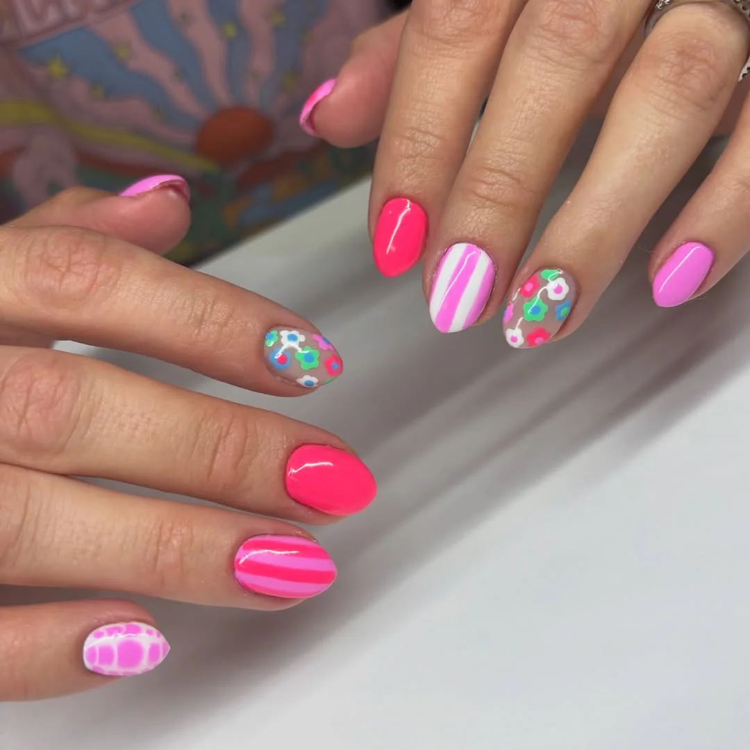 July nail colours ideas 2026 Neon Pink Mix With Florals And Stripes