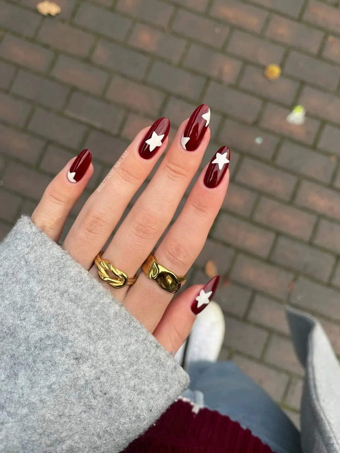 July nail colours ideas 2026 Deep Cherry Red Nails With White Stars