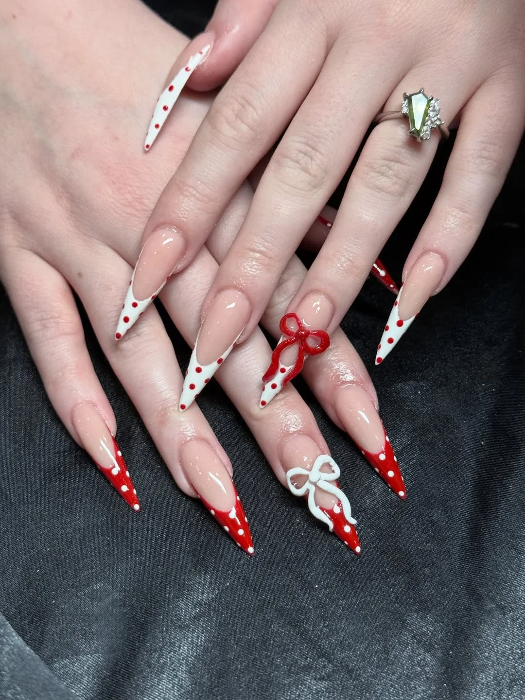 july nails design ideas 2026 + Red Polka Dot Stiletto Nails With 3D Bow Drama