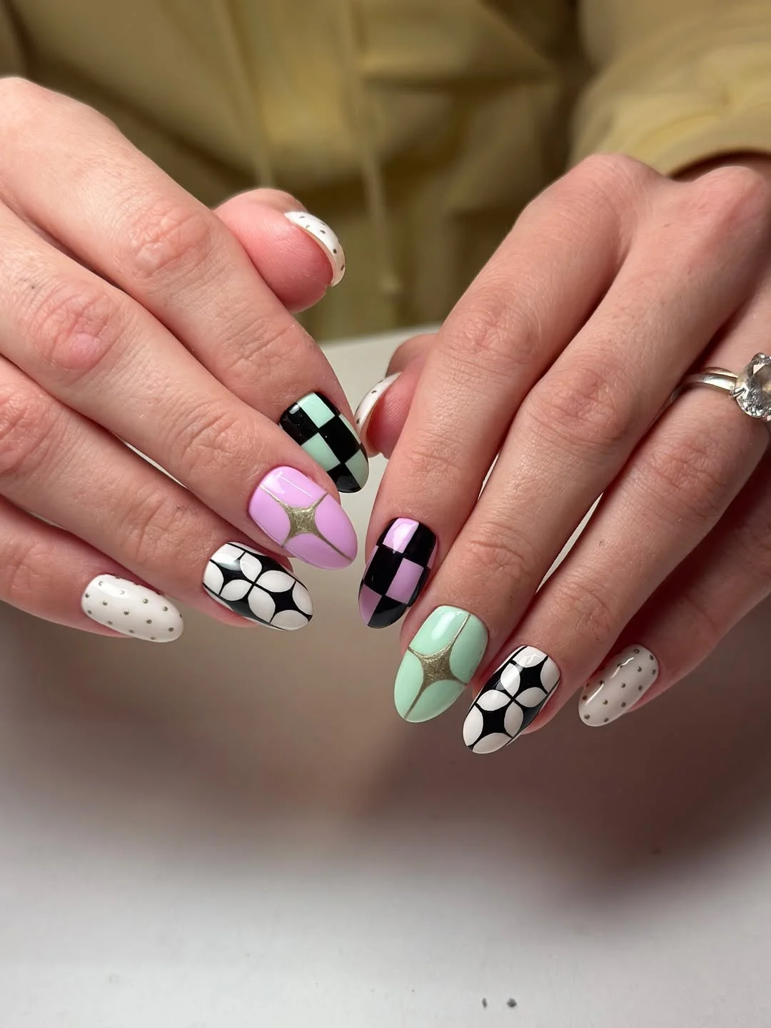 july nails design ideas 2026 + Pastel Checkerboard Nails With Graphic Summer Contrast
