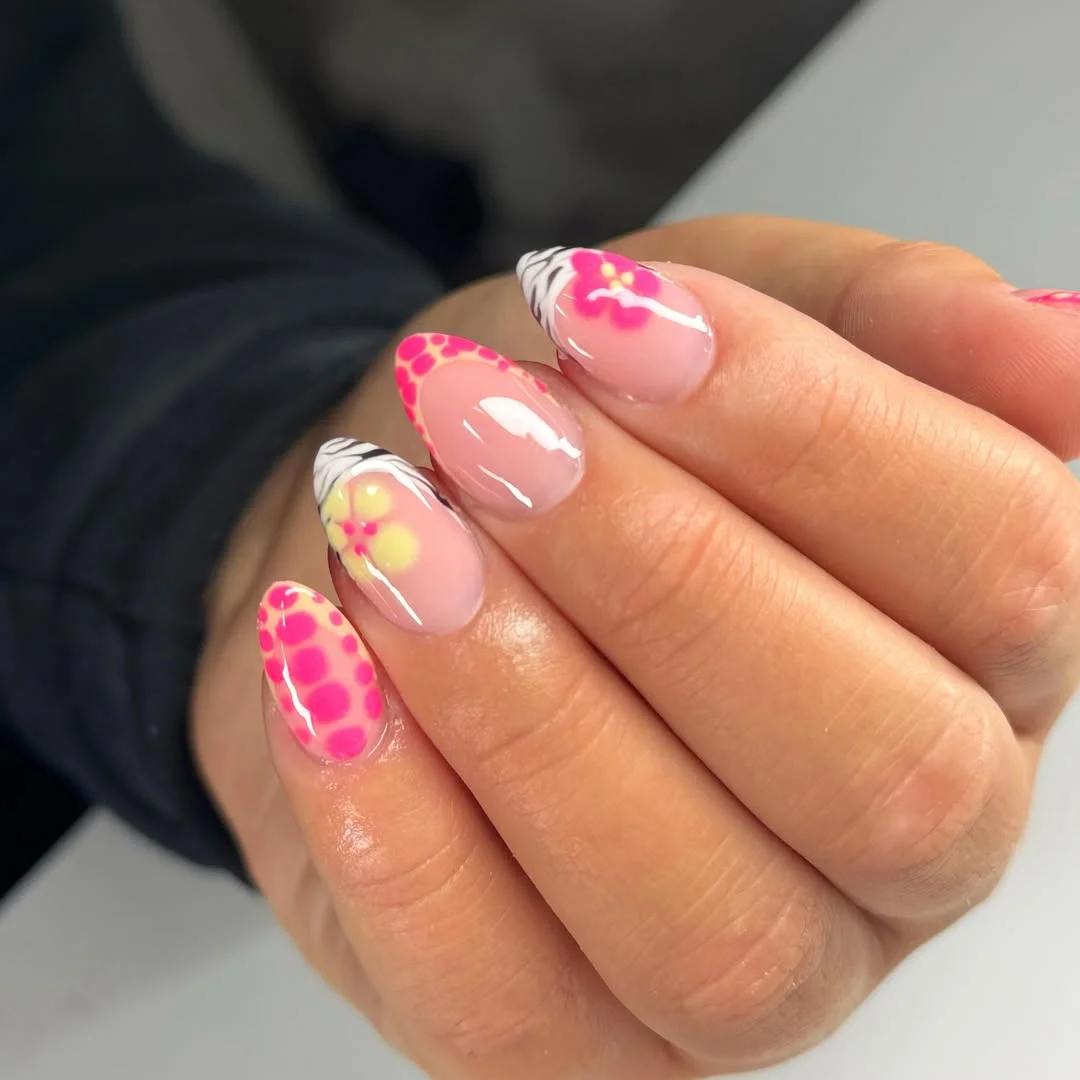 july nails design ideas 2026 + Pink Tropical Flower Nails With Zebra-Tip Energy