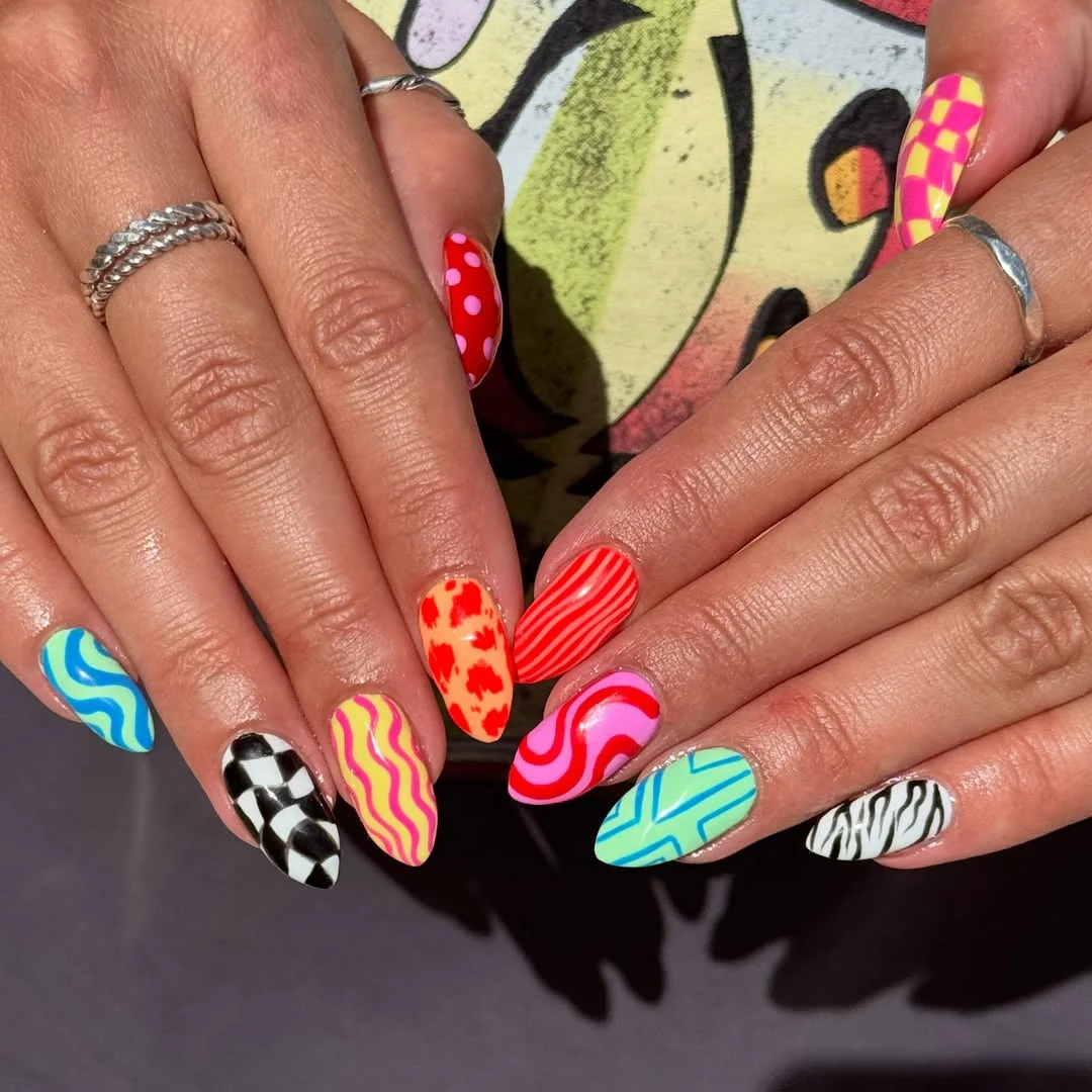july nails design ideas 2026 + Colorful Mixed-Print Nails for a Maximalist July Mood