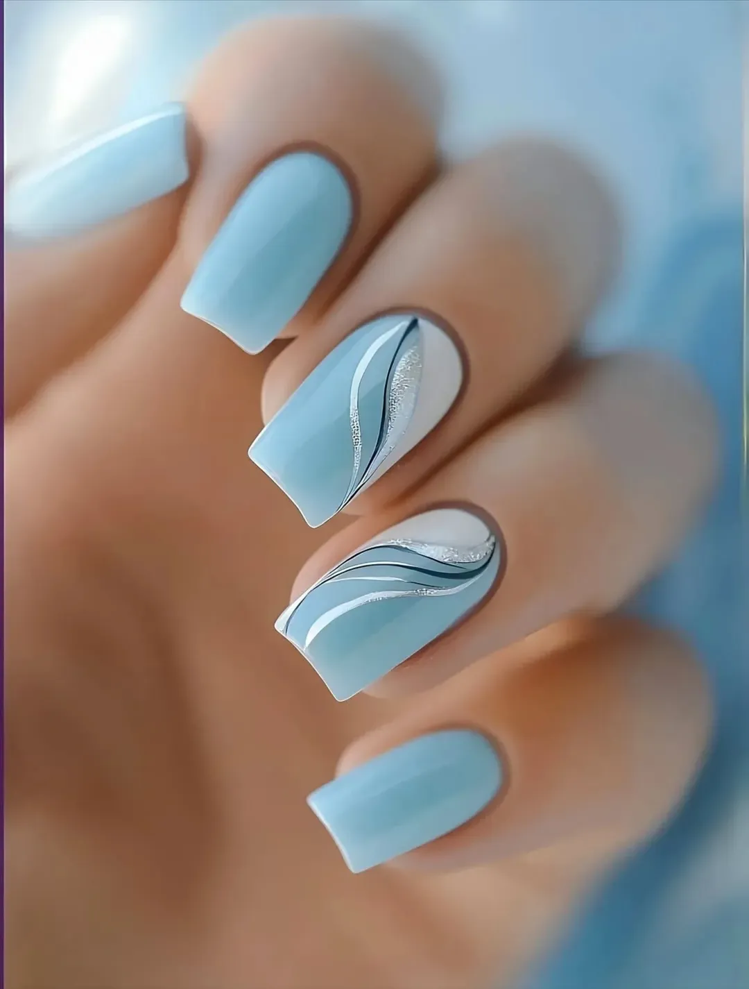 july nails design ideas 2026 + Powder Blue Swirl Nails for a Clean Summer Refresh