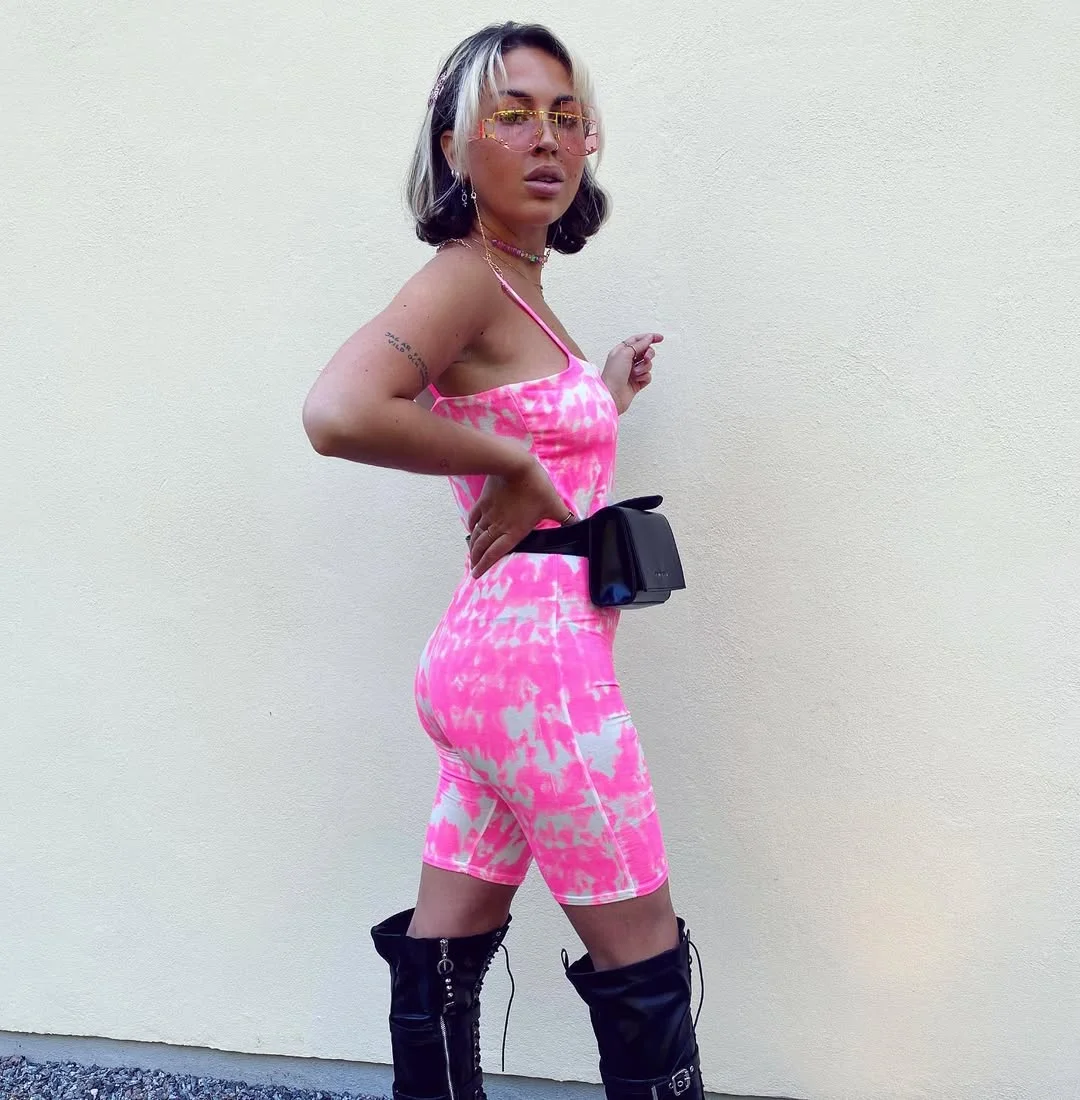 July outfits ideas 2026 + Pink Tie-Dye Romper With Black Statement Boots