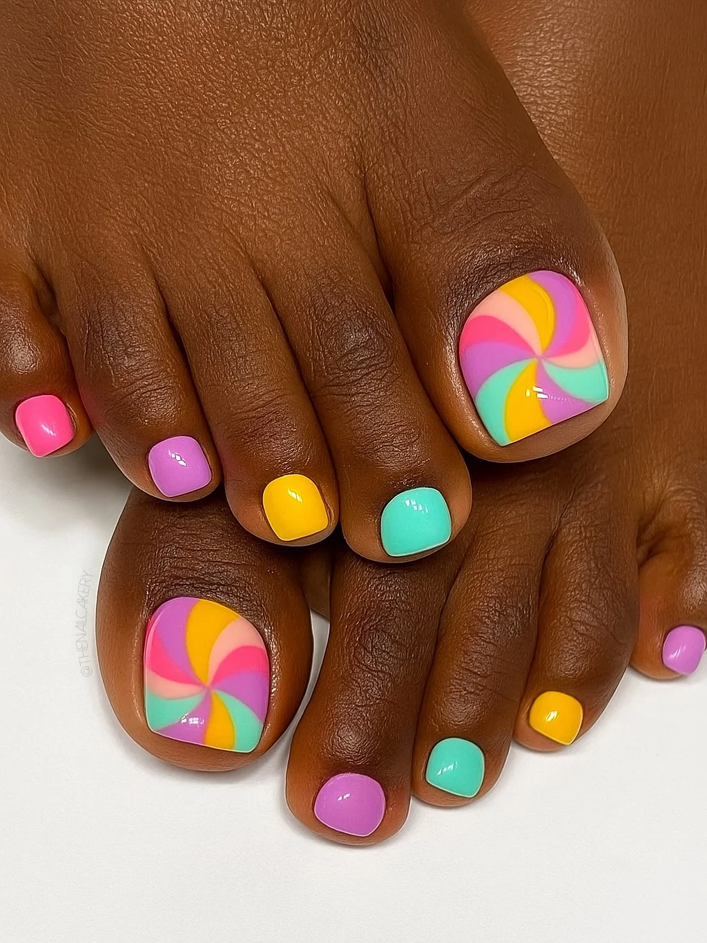 July toe nail colours ideas 2026 Candy Swirl Toes In Bright July Colors