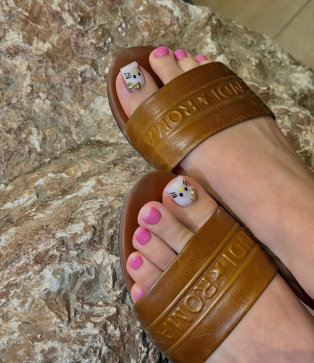 July toe nail colours ideas 2026 Cute Pink Toes With A Playful Cat Accent