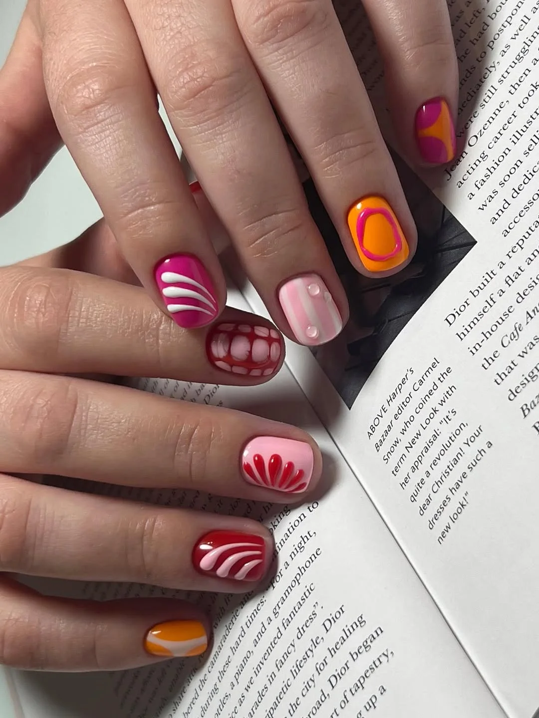 June manicure ideas 2026 Retro Pink Orange and Red Short Nails