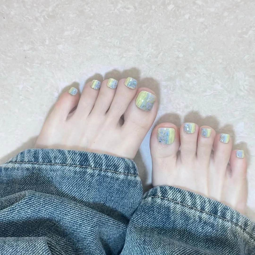June pedicure ideas 2026 + Pastel Blue and Lemon Pedicure With Soft Marble Detail