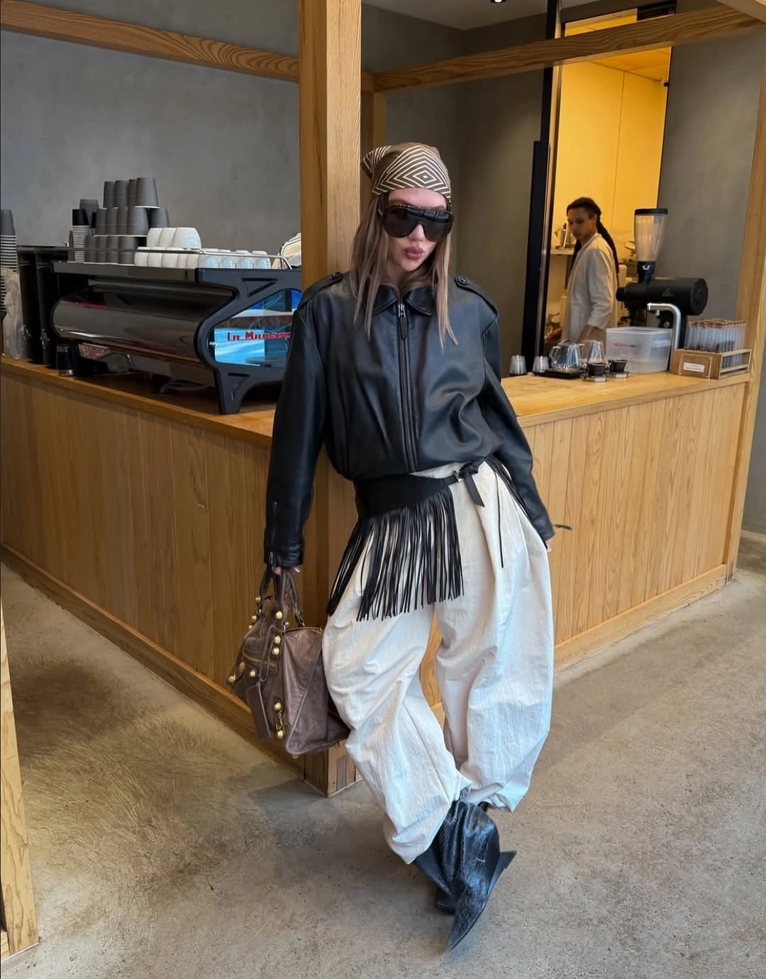 nice fall outfits 2026 Leather Jacket and Fringe Belt with Dramatic Ivory Pants