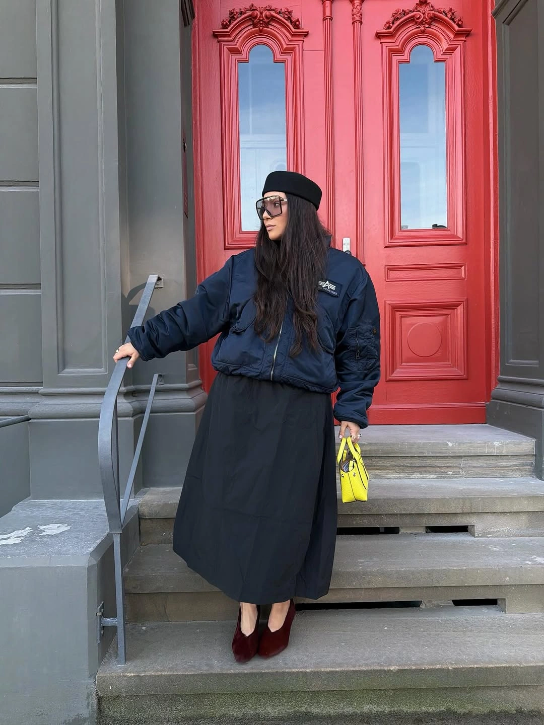 nice fall outfits 2026 A Bomber Jacket and Midi Skirt with Downtown Energy