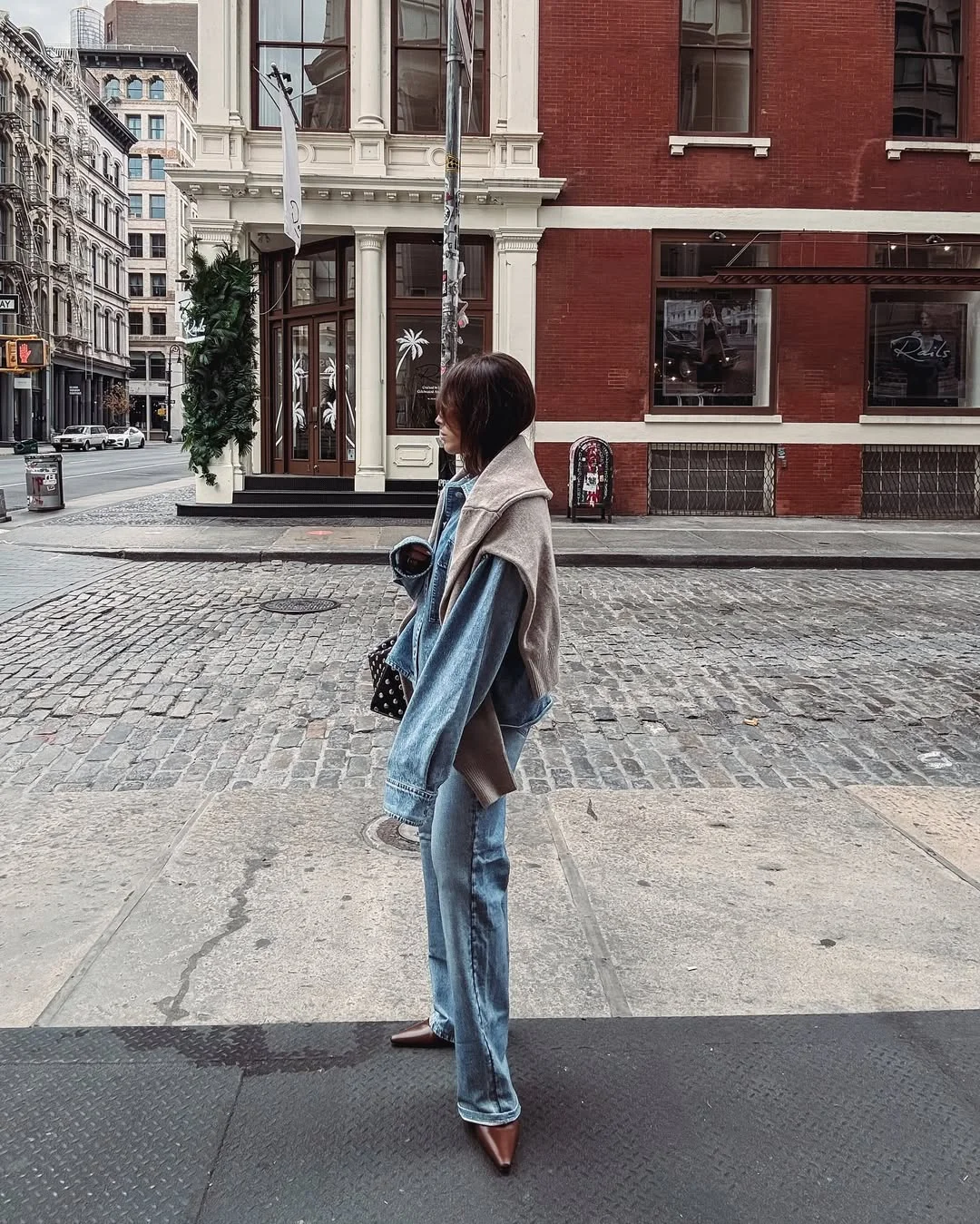 new trends fall fashion 2026 + Double Denim with a Sweater-Draped City Mood