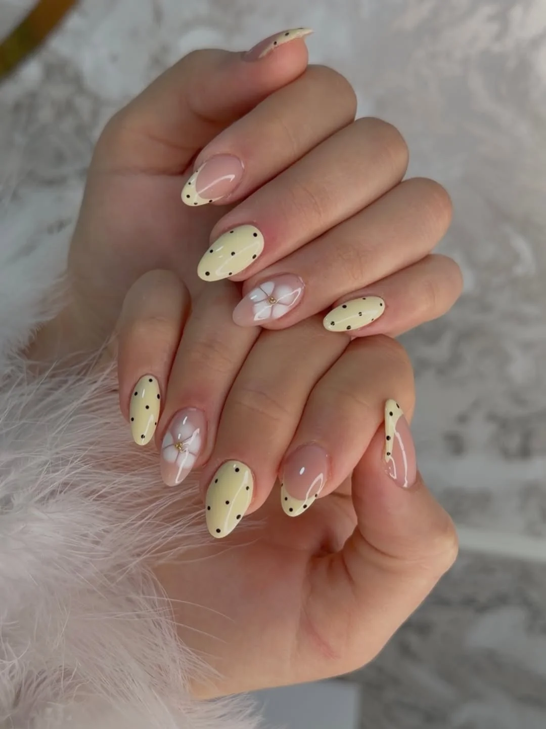 plain summer nails 2026 + Butter Yellow Almond Nails With Tiny Black Dots