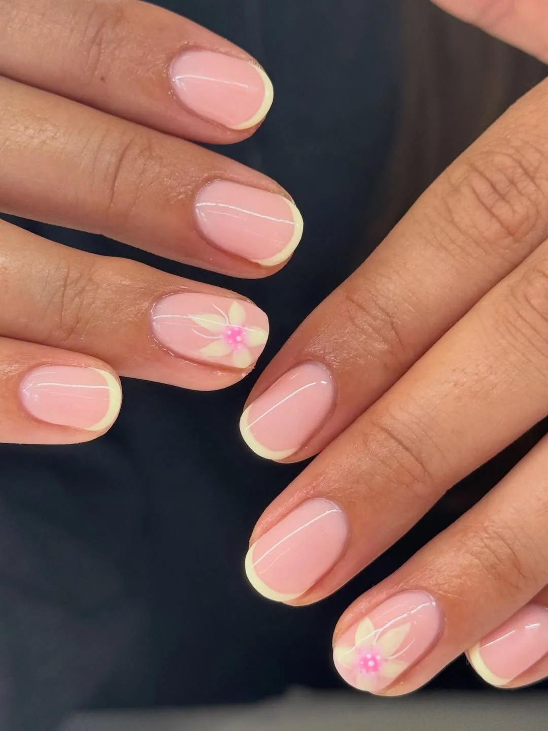 plain summer nails 2026 + Soft Yellow French Tips With Tiny Floral Detail