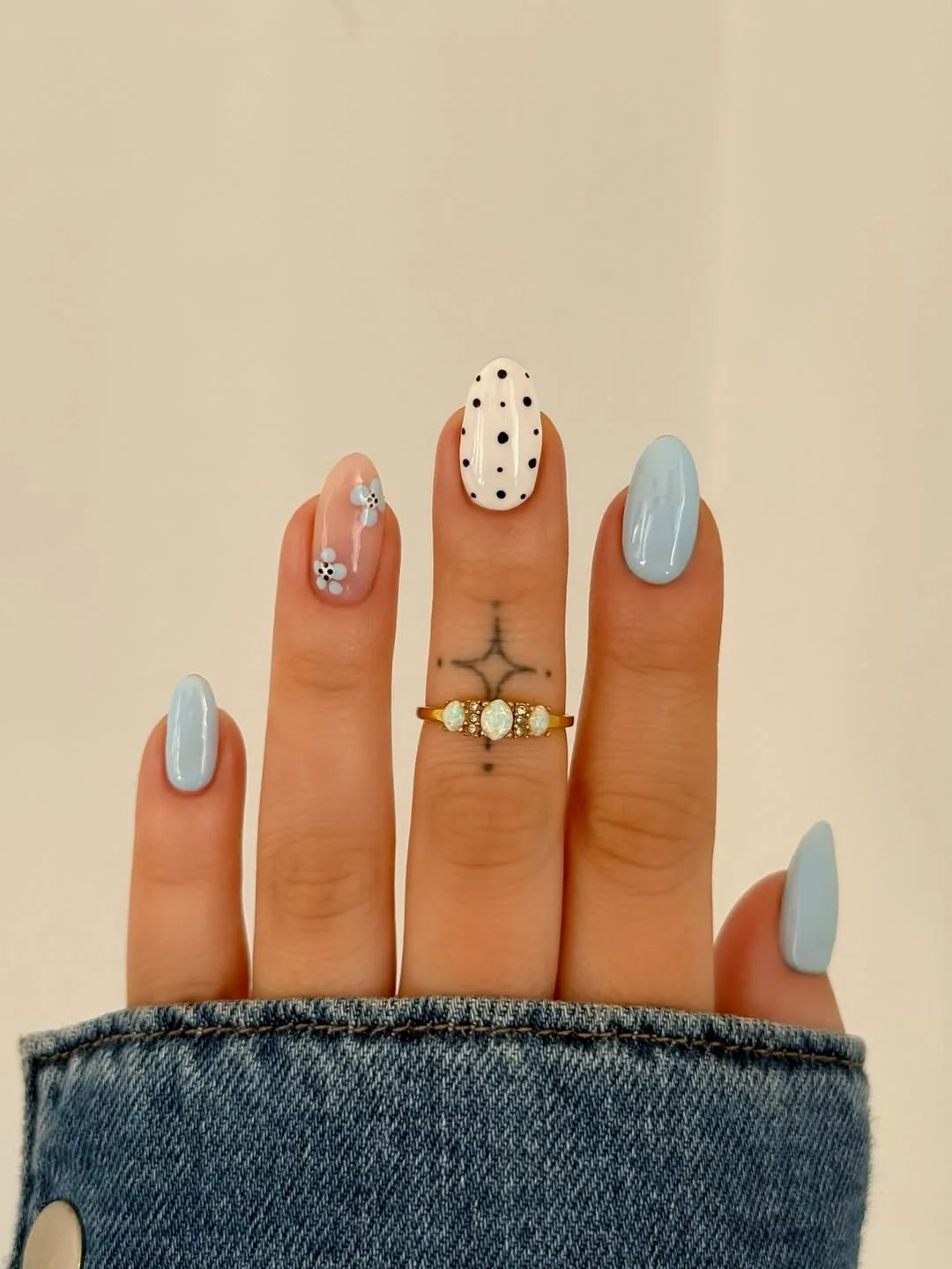plain summer nails 2026 + Powder Blue Almond Nails With Tiny Accents