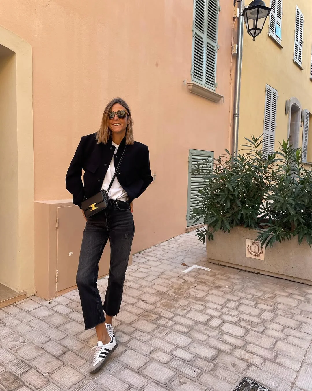 simpl fall outfits 2026 Black Jacket White Tee and Retro Sneakers