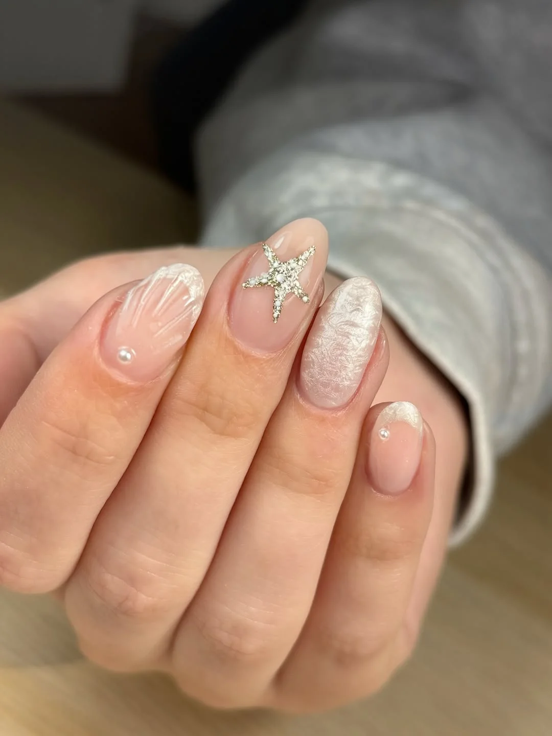 starfish summer nails 2026 + Pearly Short Nails with a Silver Starfish Accent