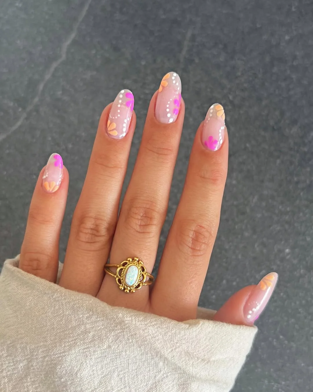 summer oval nails 2026 Sheer Oval Nails With Pink and Yellow Floral Dots