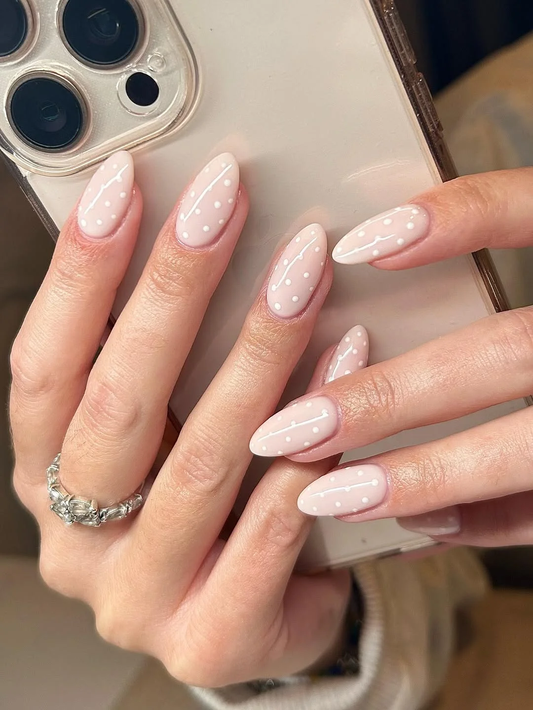 summer oval nails 2026 Glossy Nude Oval Nails With White Polka Dots