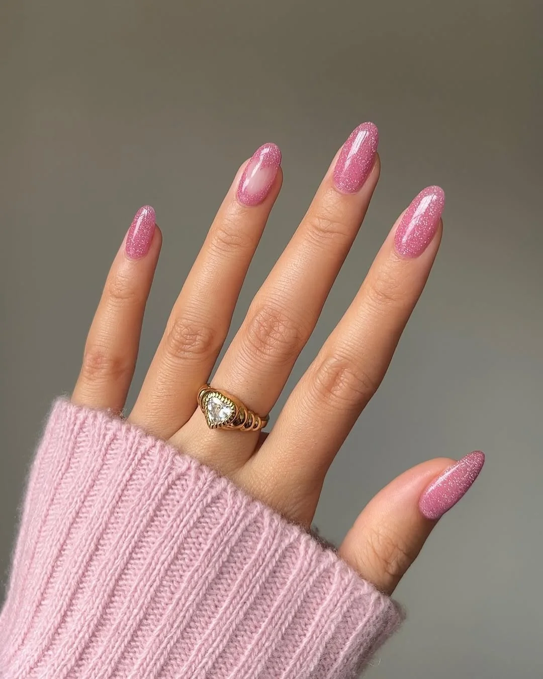 summer oval nails 2026 Sparkly Pink Oval Nails With a Glossy Glitter Finish