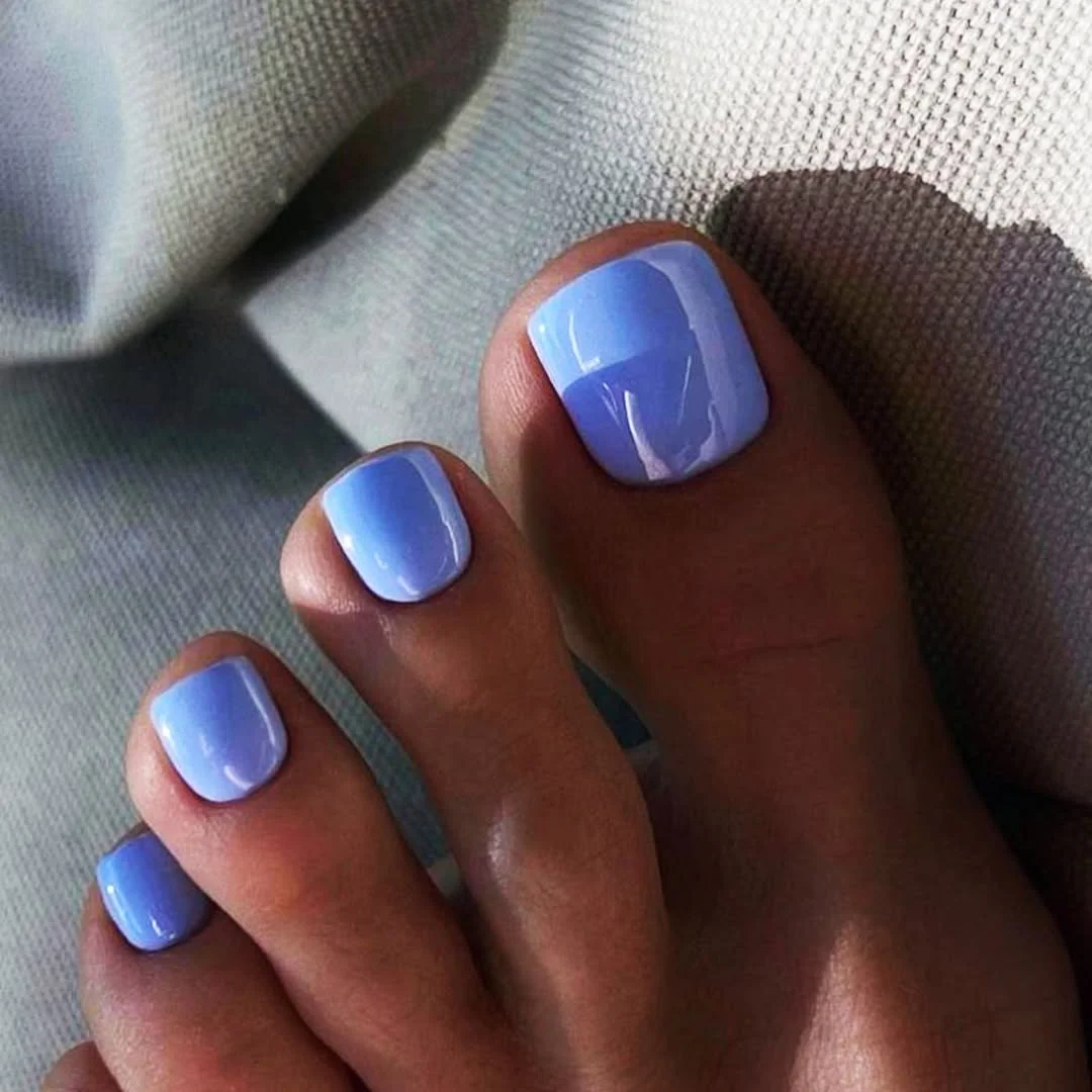 summer pedicure nail art 2026 Periwinkle Blue Pedicure With A Cool Glossy Shine