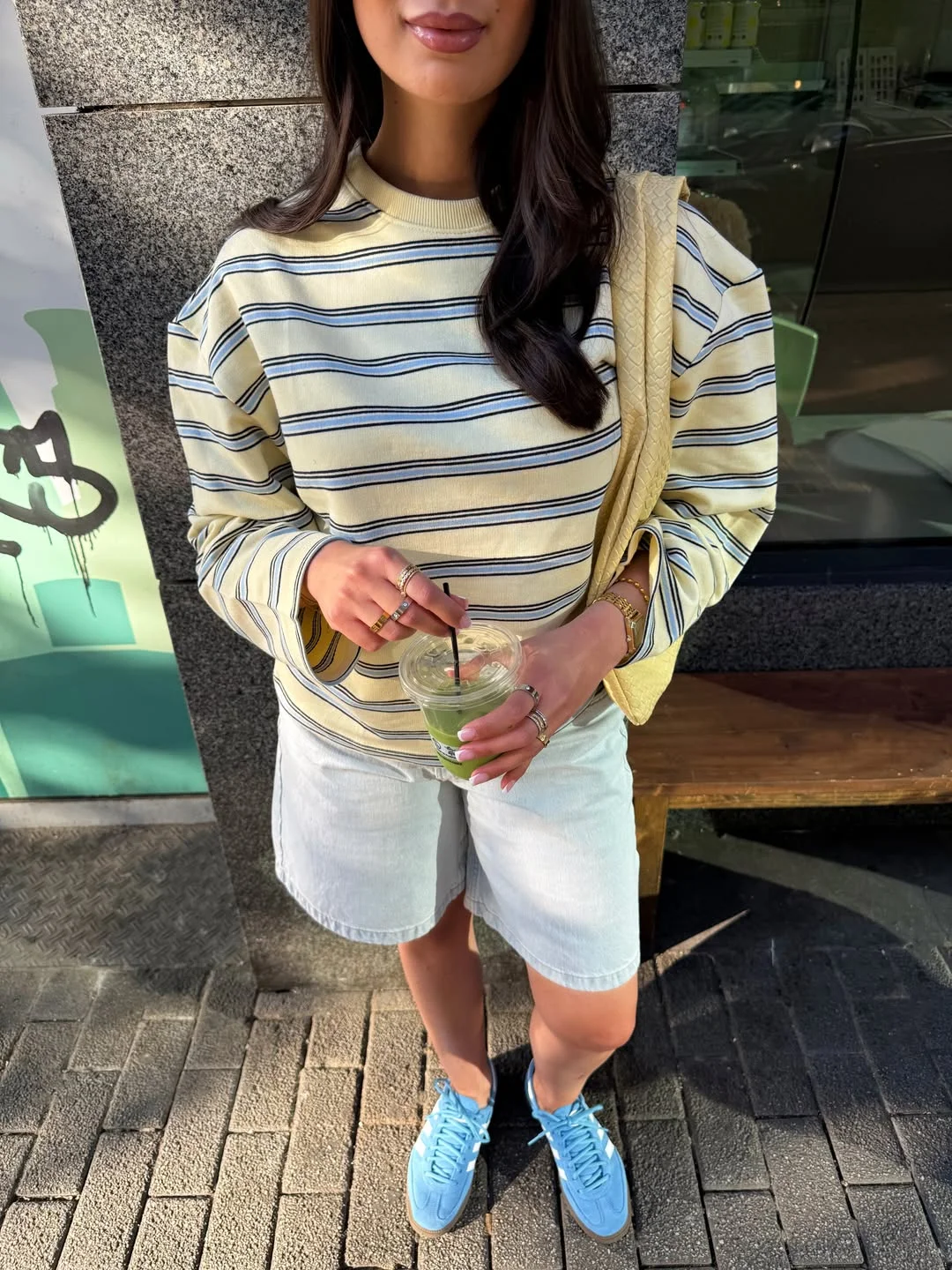 Summer to fall outfits 2026 Striped Pullover With Shorts and Blue Sneakers