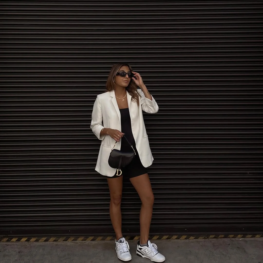 Trendy blazer outfits - fall 2026 + White Blazer With A Black Base And Sporty Sneakers