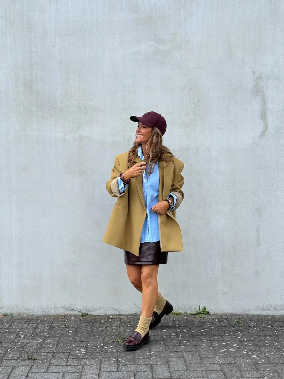 Trendy blazer outfits - fall 2026 + Oversized Tan Blazer With A Blue Shirt And Mini Skirt