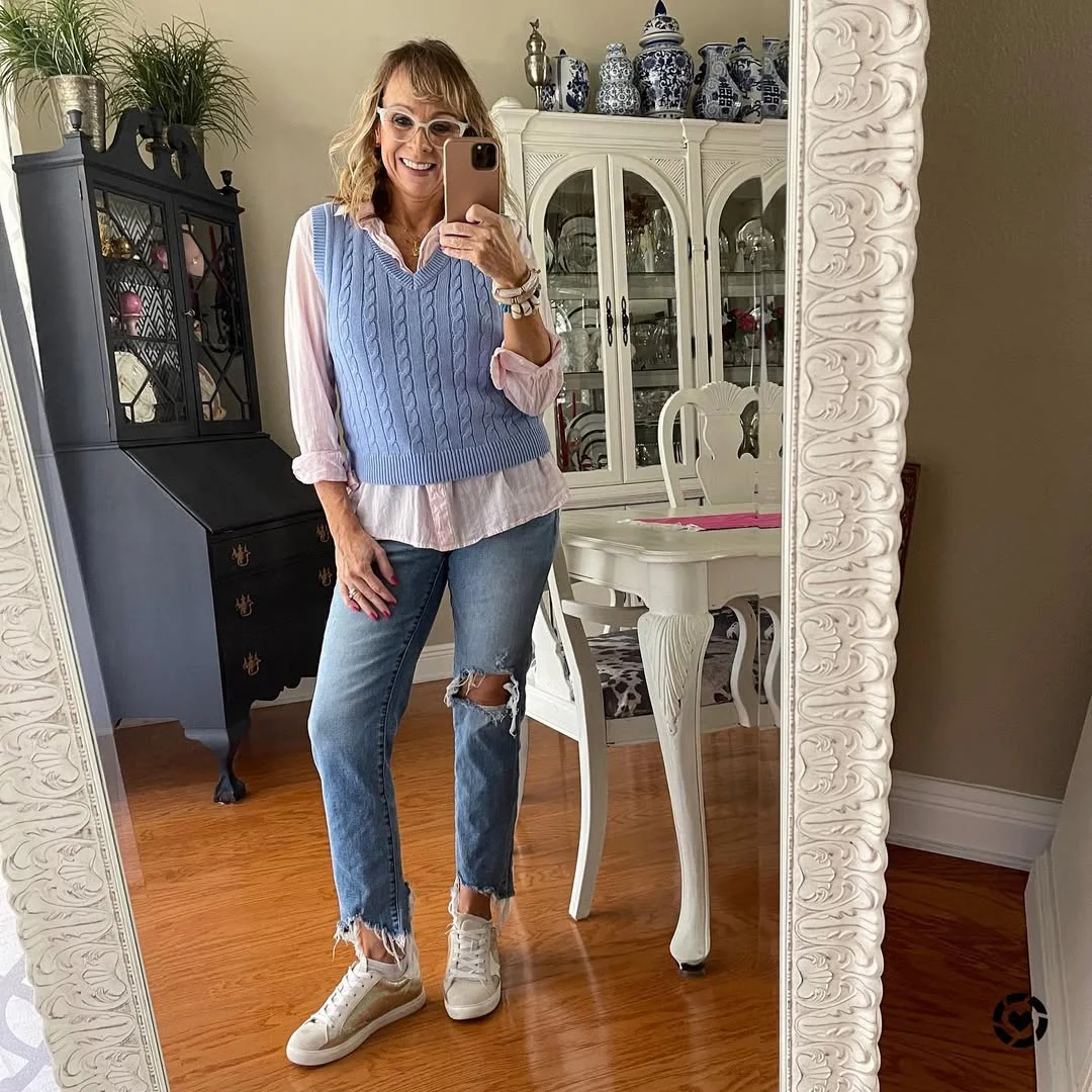 what to wear in fall 2026 over 50 Soft Blue Knit Vest With Relaxed Denim