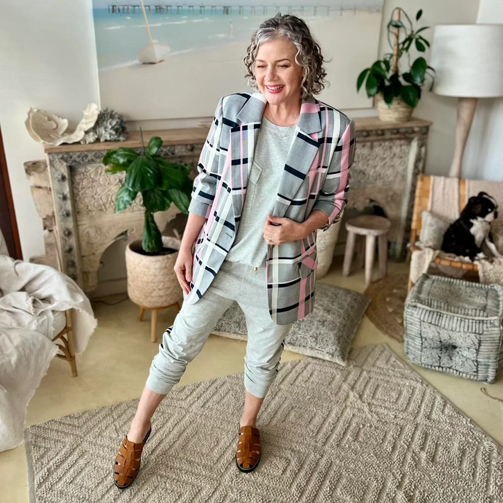 what to wear in fall 2026 over 50 Checked Blazer Over Soft Gray Layers