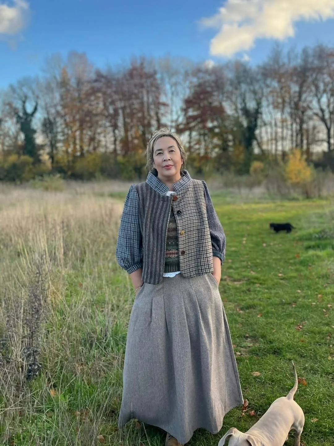 what to wear in fall 2026 over 50 Patchwork Checks With a Full Gray Skirt